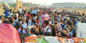 Migranten aus Burma überwinden thailändische Grenzsperre auf dem Weg nach Hause - am 1.4.2020
