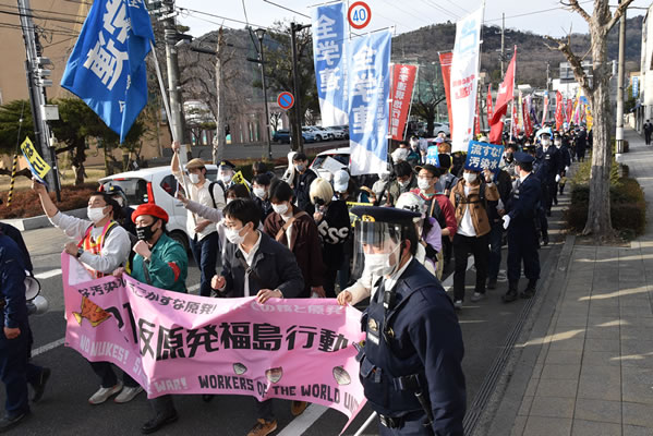 Demonstration durch die Innenstadt von Fukushima am 11. März 2022